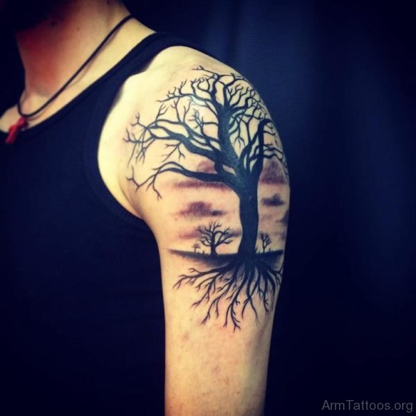 Dark Tree Tattoo Design On Left Shoulder