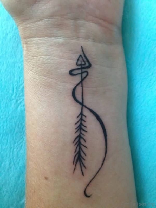 Dark black Thin Arrow Tattoo On Wrist
