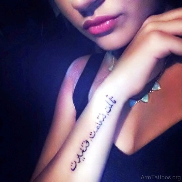 Delightful Arabic Tattoo On Arm 