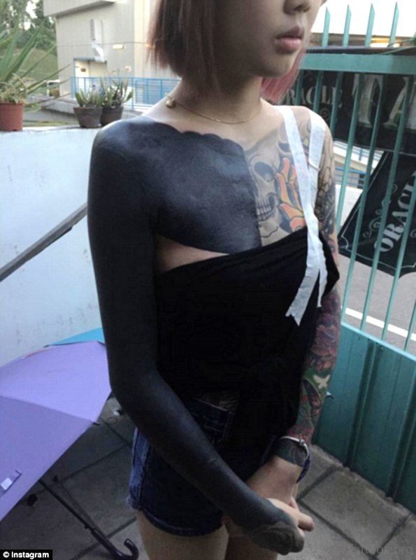 Delightful Black Tattoo On Arm 
