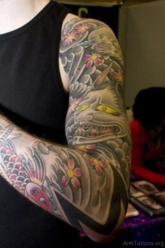 Devil And Fish Tattoo On Full Sleeve