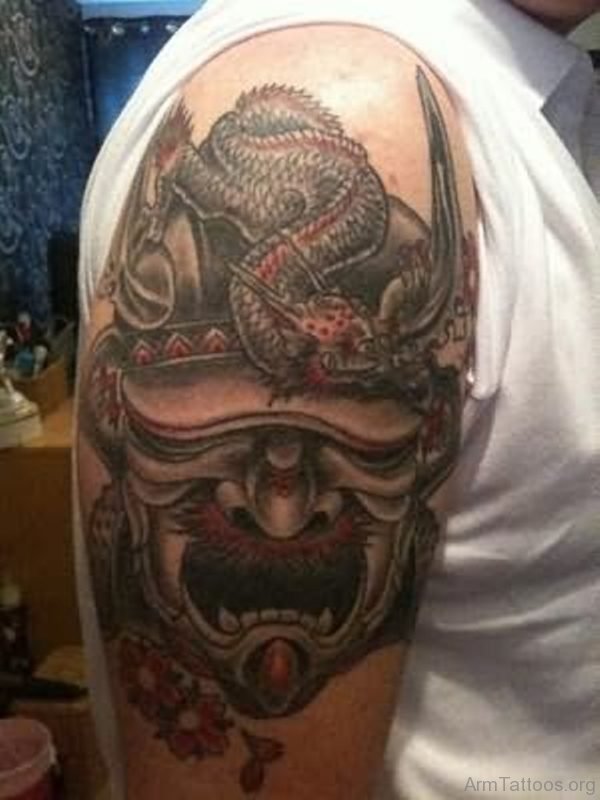 Devil Mask Tattoo On Arm 