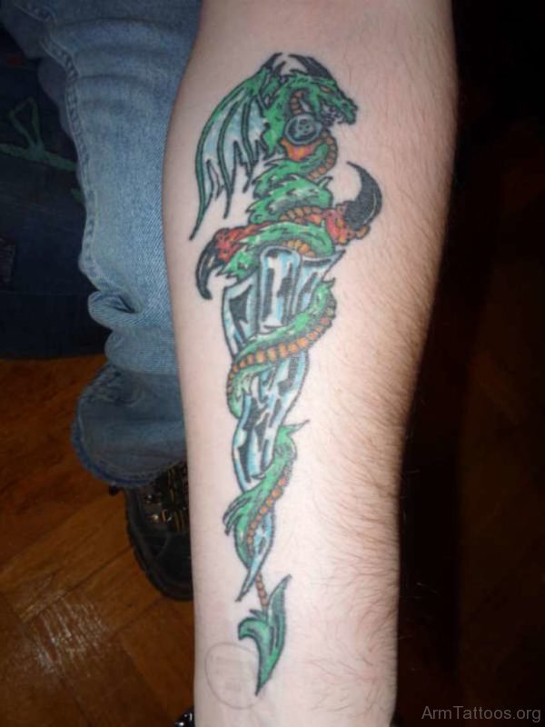 Dragon Around Dagger Tattoo On Forearm