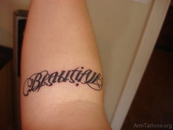 Elegant Arm Ambigram Tattoo