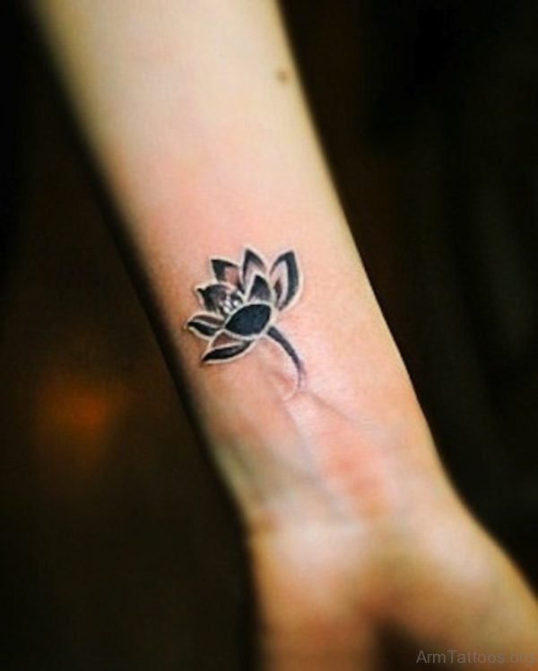 Elegant Lotus Tattoo On Arm 