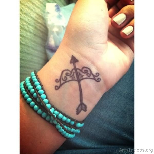 Excellent Cool Bow And Arrow Tattoo 