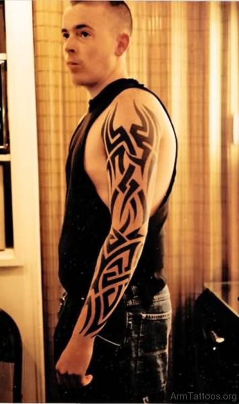 Excellent Tribal Tattoo On Full Sleeve