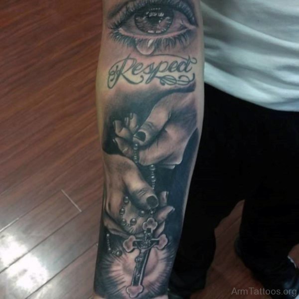 Eye And Cross Tattoo On Arm
