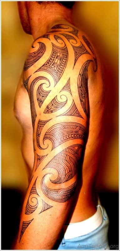 Fancy Maori Tribal Tattoo On Full Sleeve