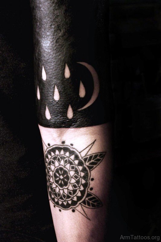 Fantastic Black Tattoo On Arm 