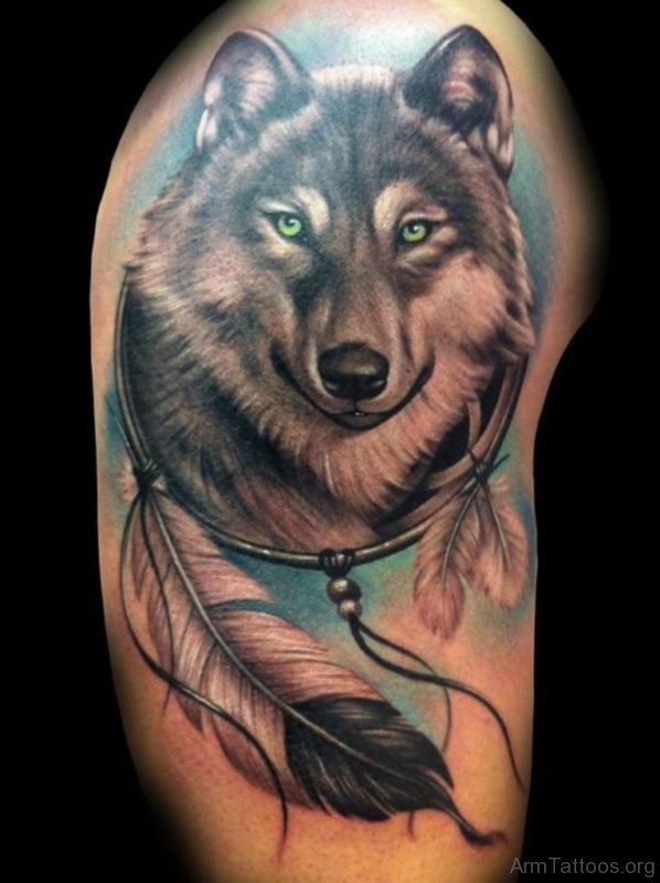 Feather And Wolf Tattoo