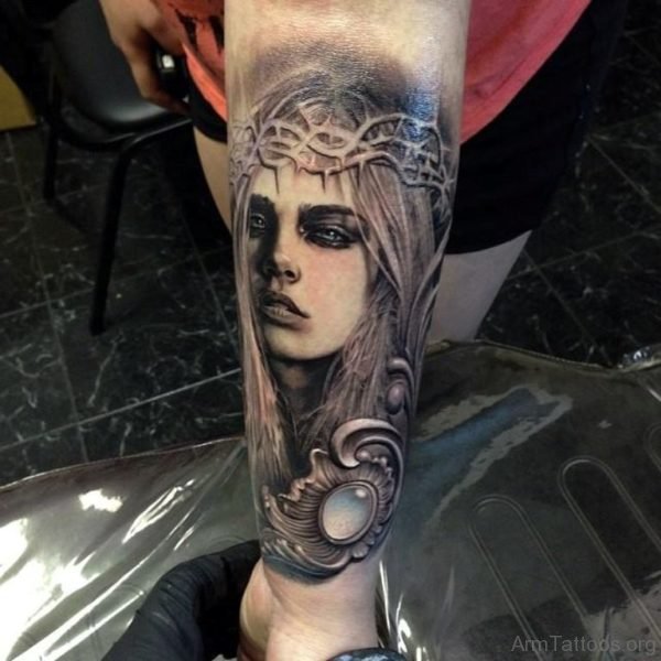 Female Portrait Tattoo On Wrist 