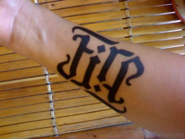Fire Ambigram Tattoo On Arm
