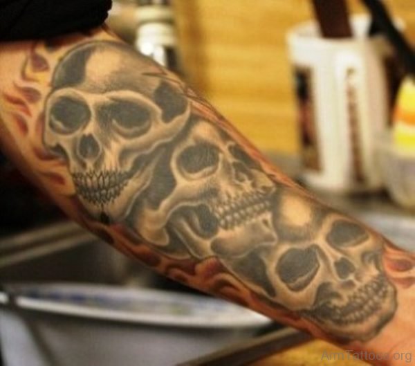 Flaming Skulls Tattoos On Arm