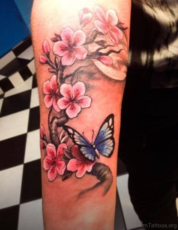 Flowers And Butterfly Tattoo On Arm