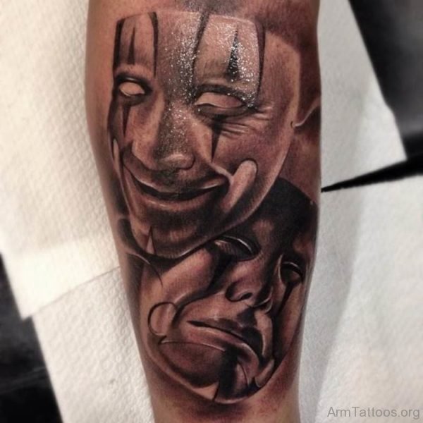 Funky Mask Tattoo On Arm 