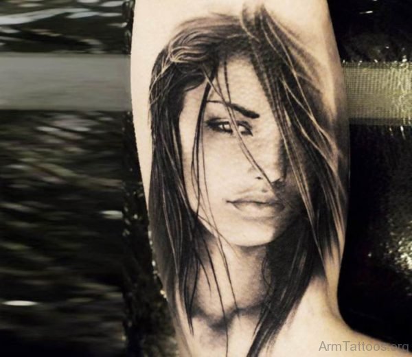 Girl Face Tattoo On Arm 