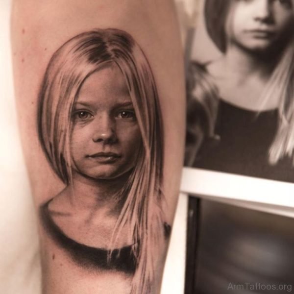 Girl Portrait Tattoo On Arm 