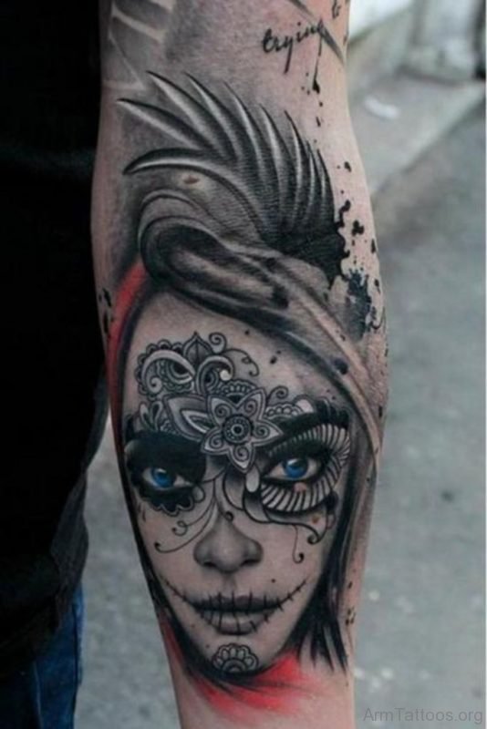 Gorgeous Blue Sugar Skull Tattoo On Arm 