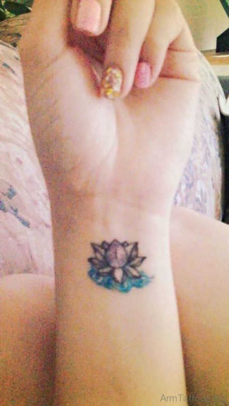 Graceful Lotus Tattoo On Arm 