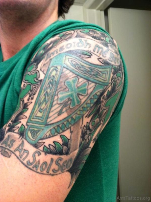 Green Color Celtic Tattoo On Arm 