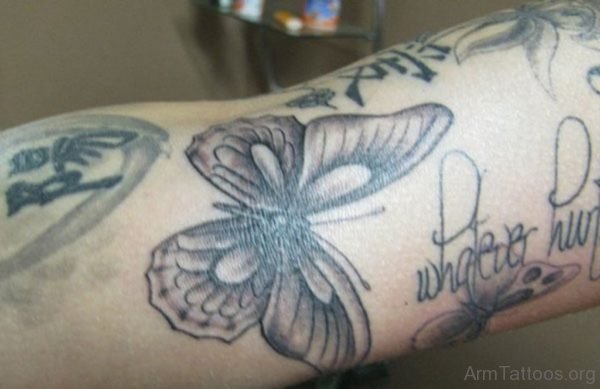 Grey Ink Butterfly Tattoo