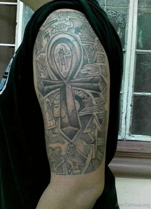 Grey Ink Egyptian Tattoo On Half Sleeve
