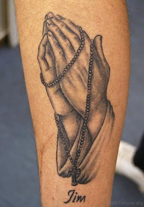 Grey Praying Hands And Rosary Tattoo