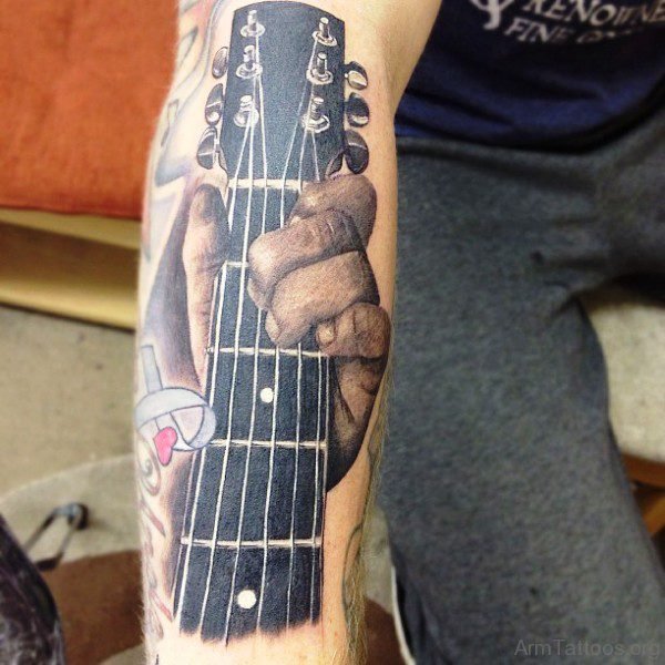 Hand Hold Guitar Tattoo On Forearm 
