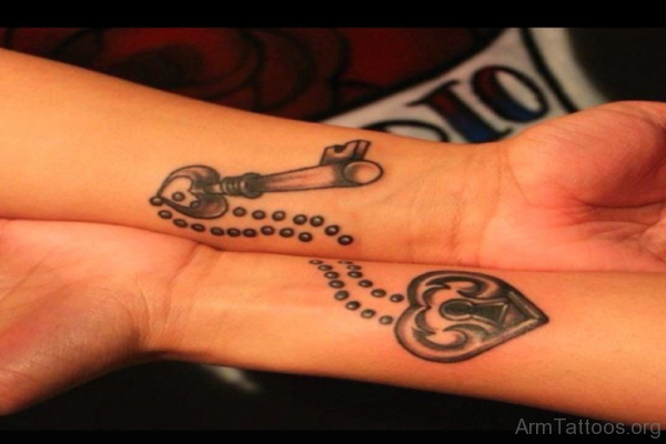 Heart And Anchor Tattoo On Wrist 