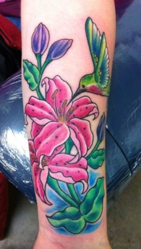 Hummingbird n Lily Flowers Tattoo On Arm
