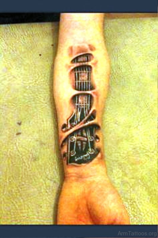 Image Of Guitar Tattoo On Forearm 