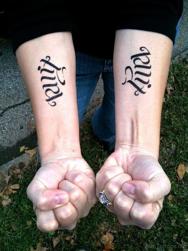 Impressive Ambigram Tattoo On Arm