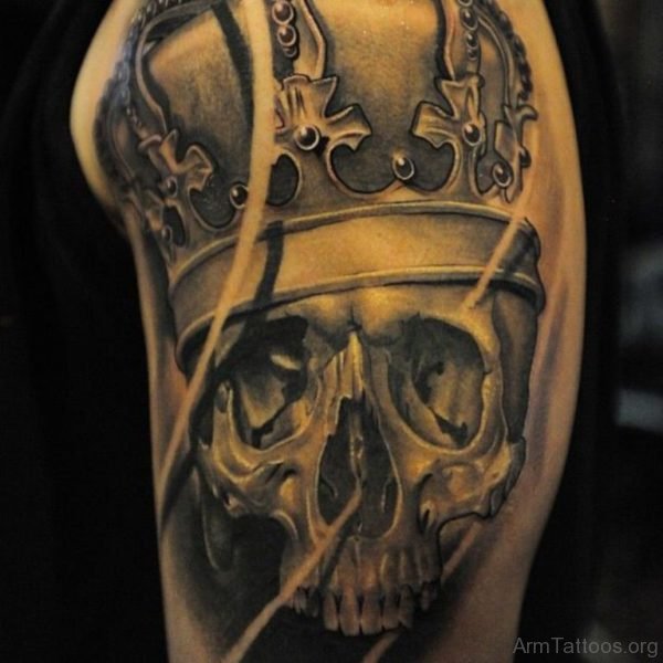 King skull arm tattoo