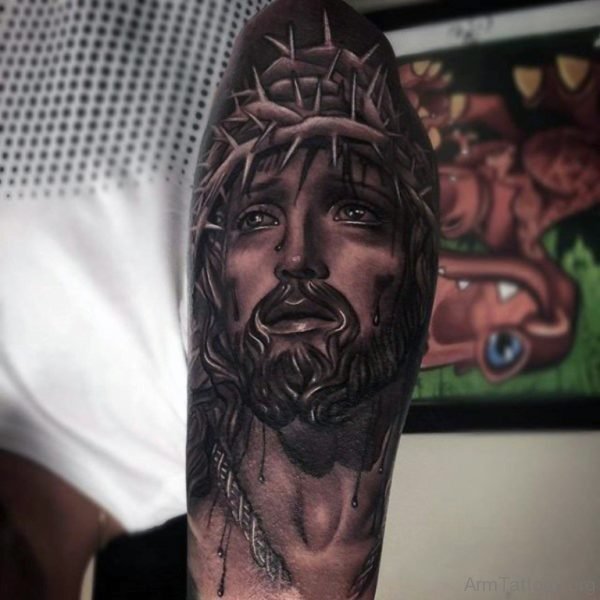 Male Jesus Portrait Arm Tattoo