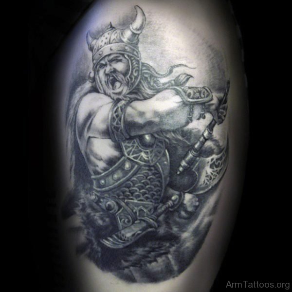 Man With Ferocious Viking Warrior Tattoo On Arm