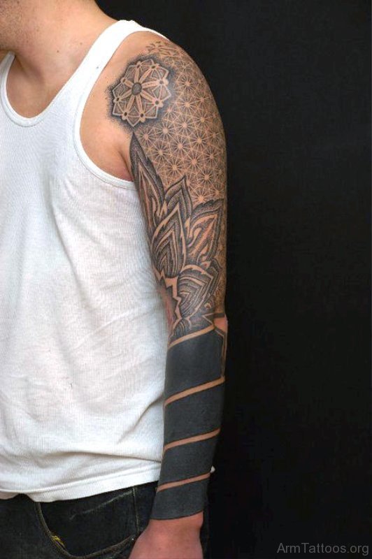 Mind Blowing Black Tattoo On Arm 