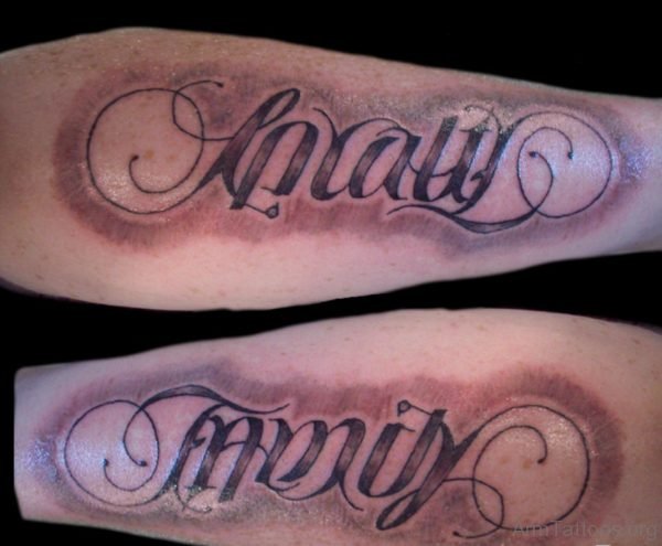 Nice Greed Ambigram Tattoo On Arm
