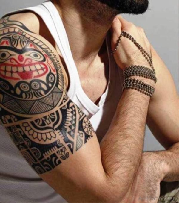 Nice Red And Black Maori Tattoo 