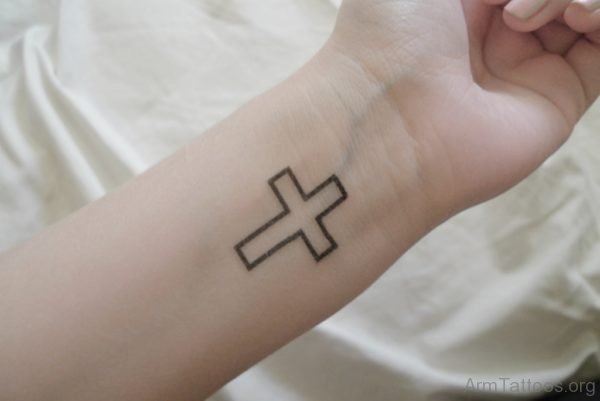 Outline Cross Tattoo On Wrist For Men