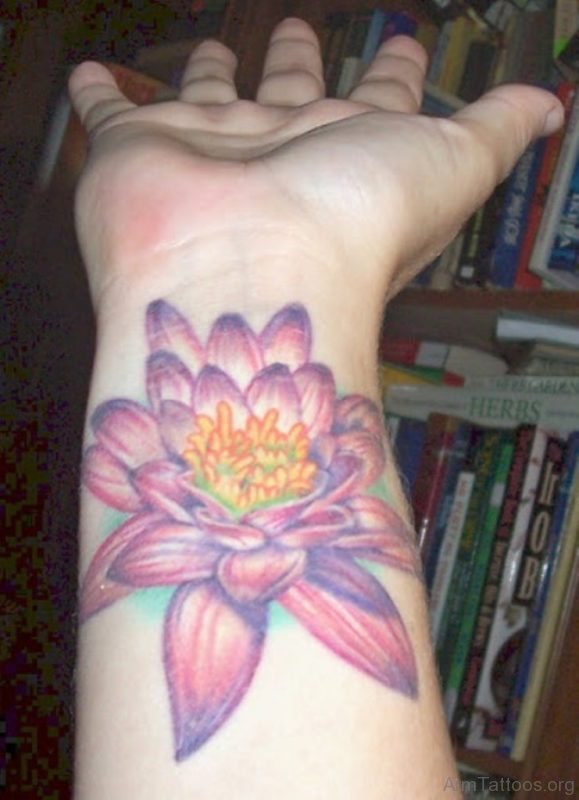 Pink Lotus Flower Tattoo On Wrist 