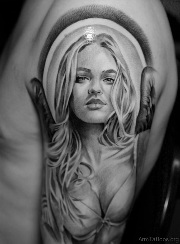 Portrait Tattoo On Bicep 