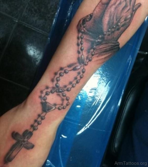 Prayig hands AnPraying hands And Rosary Tattood Rosary Tattoo