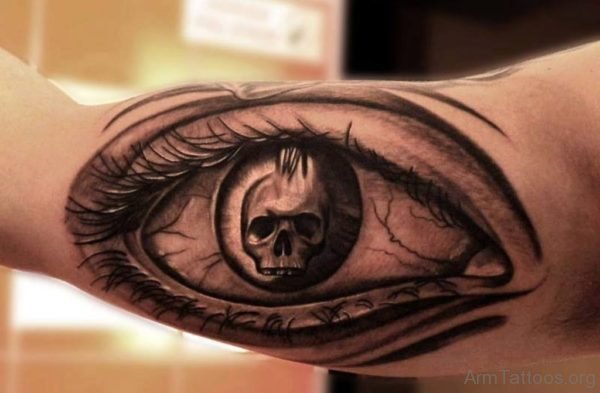 Realistic human eye tattoo on arm 
