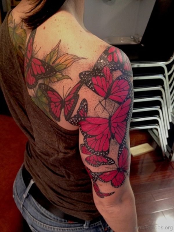 Red Ink Butterfly Tattoo On Arm
