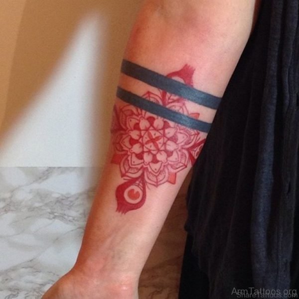 Red Ink Mandala Tattoo On Arm