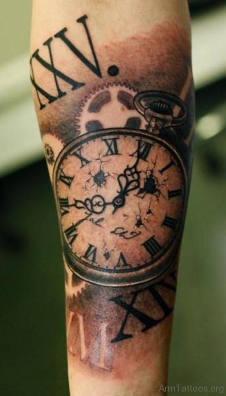 Roman Numerals Clock Tattoo On Forearm
