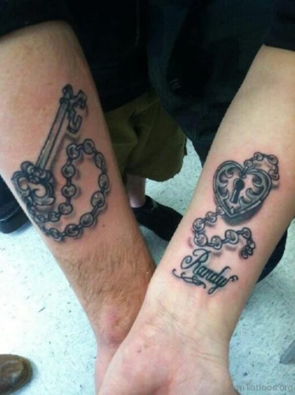 Rosary Key With Lock Tattoo On Couple Forearm