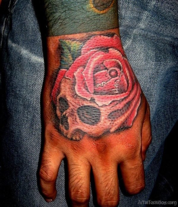 Rose And Skull Tattoo On Hand Image