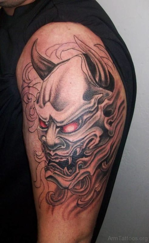 Scary Asian Hannya Mask With Red Eye Tattoo On Shoulder